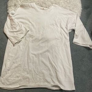 Eileen Fisher smock like shirt. Has pockets. Frayed design. Size M